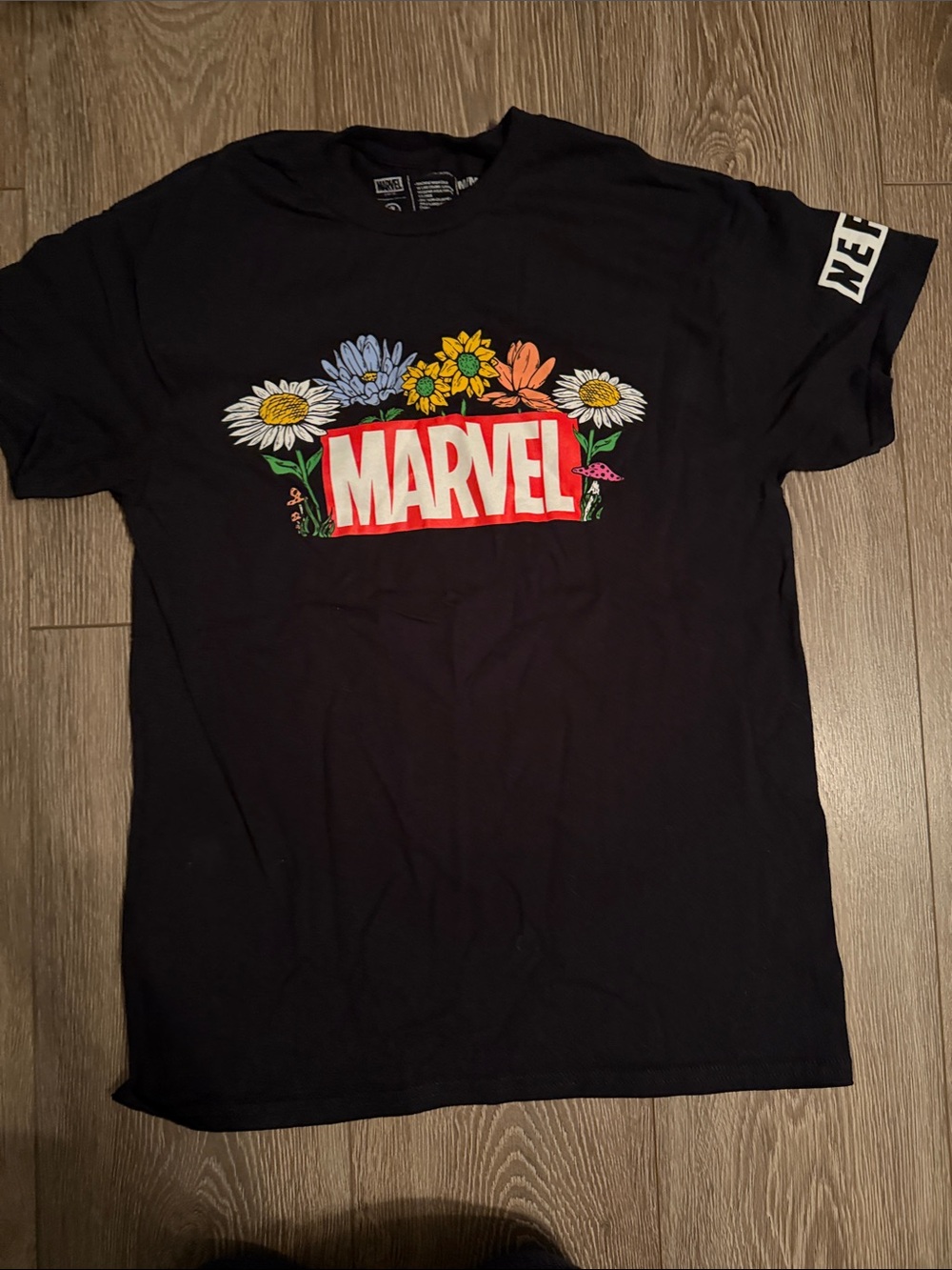 Marvel Black Tee with Colorful Floral Logo